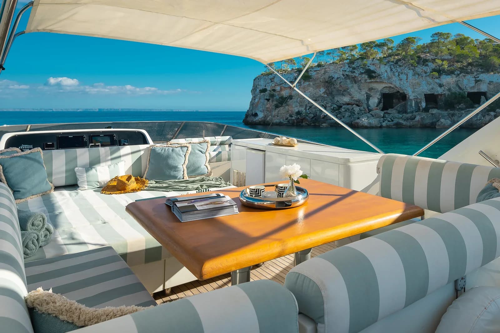 Relaxing on the aft deck of ESSOESS in a quiet cove near Palma